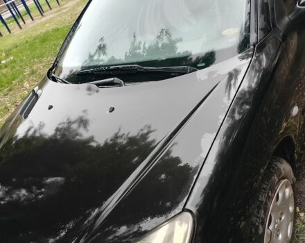 Черный Пежо 206, объемом двигателя 1.6 л и пробегом 136 тыс. км за 4000 $, фото 1 на Automoto.ua