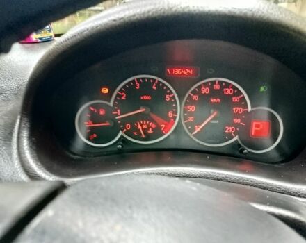 Черный Пежо 206, объемом двигателя 1.6 л и пробегом 136 тыс. км за 4000 $, фото 6 на Automoto.ua