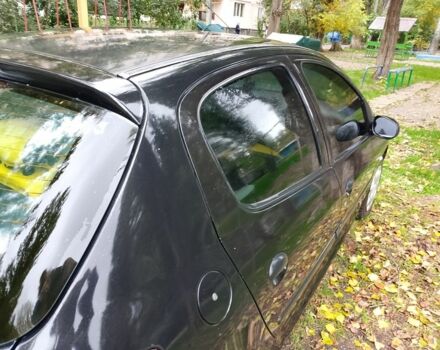 Черный Пежо 206, объемом двигателя 1.6 л и пробегом 136 тыс. км за 4000 $, фото 4 на Automoto.ua