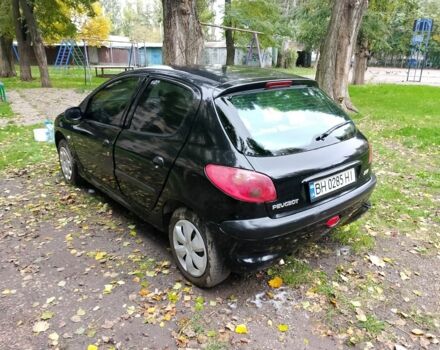 Черный Пежо 206, объемом двигателя 1.6 л и пробегом 136 тыс. км за 4000 $, фото 5 на Automoto.ua