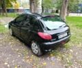 Черный Пежо 206, объемом двигателя 1.6 л и пробегом 136 тыс. км за 4000 $, фото 5 на Automoto.ua