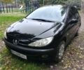 Черный Пежо 206, объемом двигателя 1.6 л и пробегом 136 тыс. км за 4000 $, фото 1 на Automoto.ua