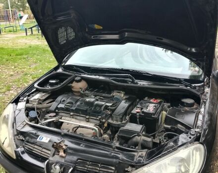 Черный Пежо 206, объемом двигателя 1.6 л и пробегом 136 тыс. км за 4000 $, фото 2 на Automoto.ua