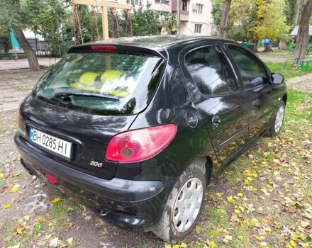Черный Пежо 206, объемом двигателя 1.6 л и пробегом 136 тыс. км за 4000 $, фото 3 на Automoto.ua