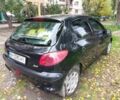 Черный Пежо 206, объемом двигателя 1.6 л и пробегом 136 тыс. км за 4000 $, фото 3 на Automoto.ua
