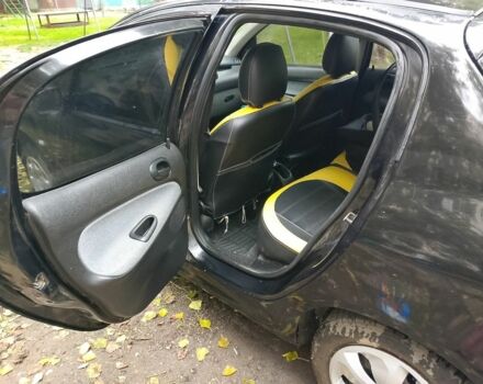 Черный Пежо 206, объемом двигателя 1.6 л и пробегом 136 тыс. км за 4000 $, фото 7 на Automoto.ua