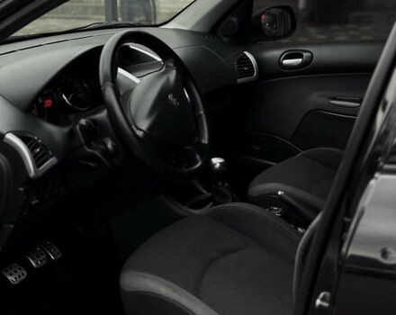 Чорний Пежо 206, об'ємом двигуна 1.4 л та пробігом 207 тис. км за 5900 $, фото 10 на Automoto.ua