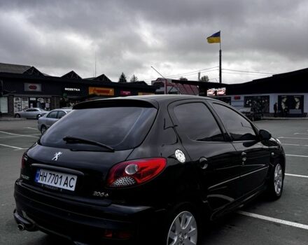 Черный Пежо 206, объемом двигателя 1.4 л и пробегом 207 тыс. км за 5900 $, фото 1 на Automoto.ua