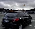 Черный Пежо 206, объемом двигателя 1.4 л и пробегом 207 тыс. км за 5900 $, фото 1 на Automoto.ua