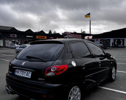Чорний Пежо 206, об'ємом двигуна 1.4 л та пробігом 207 тис. км за 5900 $, фото 3 на Automoto.ua