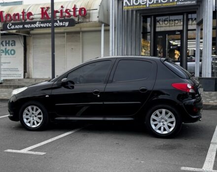 Черный Пежо 206, объемом двигателя 1.4 л и пробегом 207 тыс. км за 5900 $, фото 2 на Automoto.ua