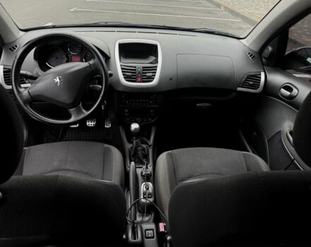 Черный Пежо 206, объемом двигателя 1.4 л и пробегом 207 тыс. км за 5900 $, фото 7 на Automoto.ua