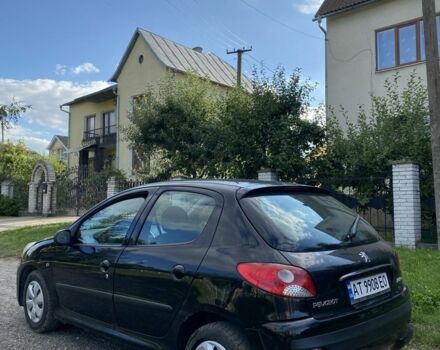 Черный Пежо 206, объемом двигателя 1.4 л и пробегом 249 тыс. км за 4100 $, фото 2 на Automoto.ua