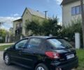 Черный Пежо 206, объемом двигателя 1.4 л и пробегом 249 тыс. км за 4100 $, фото 2 на Automoto.ua