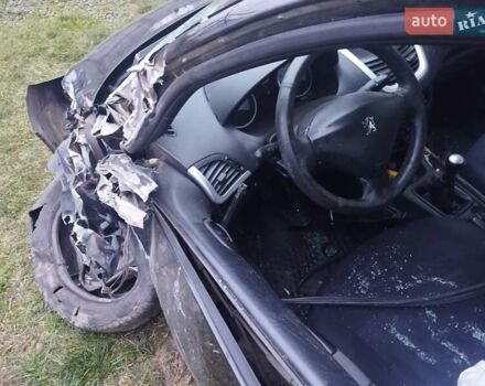 Черный Пежо 206, объемом двигателя 1.4 л и пробегом 250 тыс. км за 2000 $, фото 4 на Automoto.ua