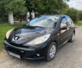 Черный Пежо 206, объемом двигателя 1.4 л и пробегом 249 тыс. км за 4100 $, фото 1 на Automoto.ua