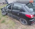 Черный Пежо 206, объемом двигателя 1.4 л и пробегом 250 тыс. км за 2000 $, фото 5 на Automoto.ua