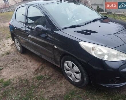 Черный Пежо 206, объемом двигателя 1.4 л и пробегом 250 тыс. км за 2000 $, фото 6 на Automoto.ua