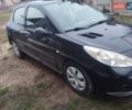 Черный Пежо 206, объемом двигателя 1.4 л и пробегом 250 тыс. км за 2000 $, фото 6 на Automoto.ua