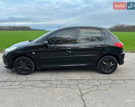 Чорний Пежо 206, об'ємом двигуна 1.4 л та пробігом 263 тис. км за 4300 $, фото 7 на Automoto.ua