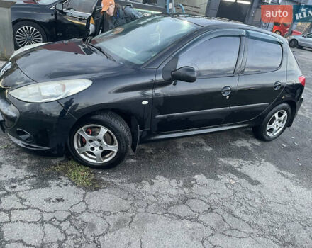 Черный Пежо 206, объемом двигателя 1.1 л и пробегом 335 тыс. км за 3200 $, фото 1 на Automoto.ua