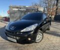 Черный Пежо 206, объемом двигателя 1.4 л и пробегом 152 тыс. км за 4500 $, фото 1 на Automoto.ua