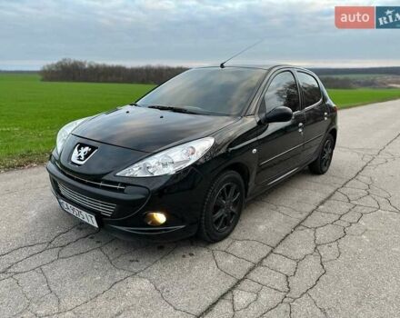 Чорний Пежо 206, об'ємом двигуна 1.4 л та пробігом 263 тис. км за 4300 $, фото 6 на Automoto.ua