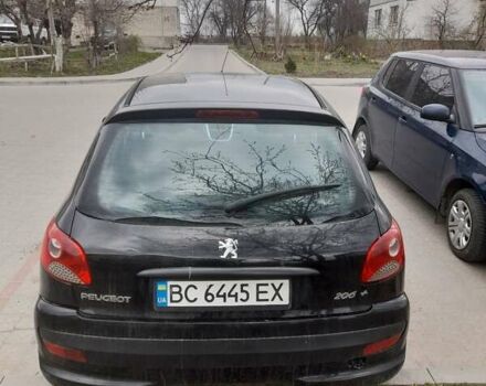 Черный Пежо 206, объемом двигателя 1.4 л и пробегом 174 тыс. км за 3800 $, фото 3 на Automoto.ua