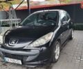 Черный Пежо 206, объемом двигателя 1.1 л и пробегом 130 тыс. км за 4250 $, фото 1 на Automoto.ua
