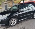 Черный Пежо 206, объемом двигателя 1.1 л и пробегом 130 тыс. км за 4250 $, фото 7 на Automoto.ua