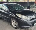 Черный Пежо 206, объемом двигателя 1.1 л и пробегом 130 тыс. км за 4250 $, фото 1 на Automoto.ua