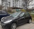 Черный Пежо 206, объемом двигателя 1.4 л и пробегом 174 тыс. км за 3800 $, фото 1 на Automoto.ua