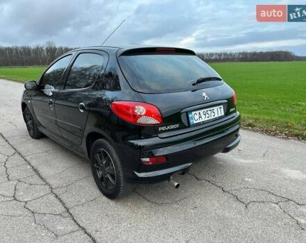 Чорний Пежо 206, об'ємом двигуна 1.4 л та пробігом 263 тис. км за 4300 $, фото 8 на Automoto.ua