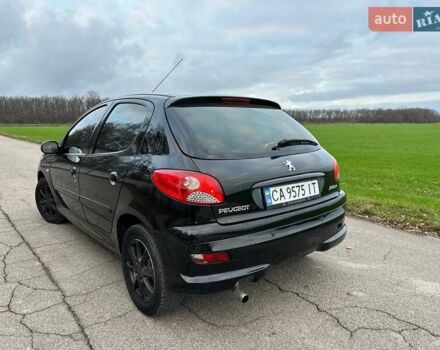 Чорний Пежо 206, об'ємом двигуна 1.4 л та пробігом 263 тис. км за 4300 $, фото 5 на Automoto.ua