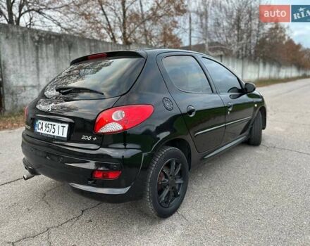 Чорний Пежо 206, об'ємом двигуна 1.4 л та пробігом 263 тис. км за 4300 $, фото 4 на Automoto.ua