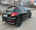 Чорний Пежо 206, об'ємом двигуна 1.4 л та пробігом 263 тис. км за 4300 $, фото 4 на Automoto.ua