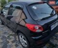Черный Пежо 206, объемом двигателя 1.36 л и пробегом 150 тыс. км за 4600 $, фото 8 на Automoto.ua