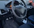 Черный Пежо 206, объемом двигателя 1.36 л и пробегом 150 тыс. км за 4600 $, фото 7 на Automoto.ua
