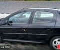 Черный Пежо 206, объемом двигателя 1.4 л и пробегом 0 тыс. км за 4500 $, фото 1 на Automoto.ua