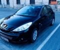 Черный Пежо 206, объемом двигателя 1.4 л и пробегом 177 тыс. км за 5200 $, фото 1 на Automoto.ua