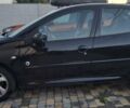 Черный Пежо 206, объемом двигателя 1.36 л и пробегом 150 тыс. км за 4600 $, фото 3 на Automoto.ua