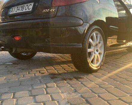 Черный Пежо 206, объемом двигателя 2 л и пробегом 134 тыс. км за 2900 $, фото 4 на Automoto.ua