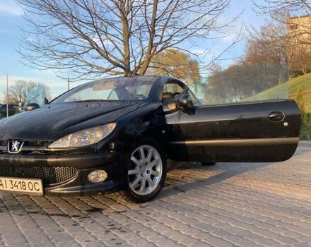 Черный Пежо 206, объемом двигателя 2 л и пробегом 134 тыс. км за 2900 $, фото 1 на Automoto.ua