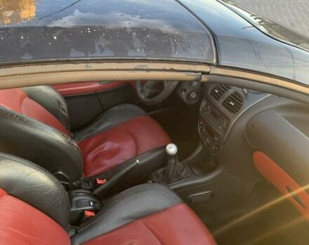 Черный Пежо 206, объемом двигателя 2 л и пробегом 134 тыс. км за 2900 $, фото 7 на Automoto.ua