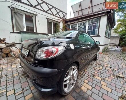 Черный Пежо 206, объемом двигателя 2 л и пробегом 238 тыс. км за 5000 $, фото 6 на Automoto.ua