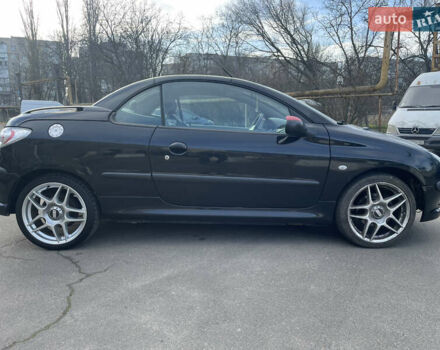 Черный Пежо 206, объемом двигателя 2 л и пробегом 238 тыс. км за 3400 $, фото 5 на Automoto.ua