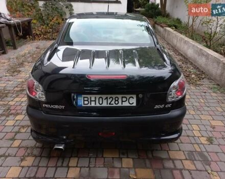 Черный Пежо 206, объемом двигателя 2 л и пробегом 238 тыс. км за 5000 $, фото 4 на Automoto.ua