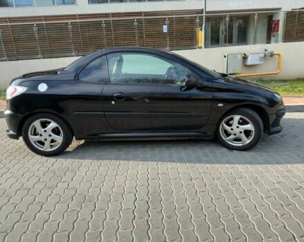 Черный Пежо 206, объемом двигателя 1.6 л и пробегом 230 тыс. км за 4096 $, фото 1 на Automoto.ua