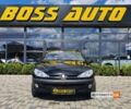 Черный Пежо 206, объемом двигателя 2 л и пробегом 189 тыс. км за 4400 $, фото 7 на Automoto.ua