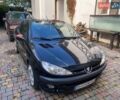 Черный Пежо 206, объемом двигателя 2 л и пробегом 238 тыс. км за 5000 $, фото 1 на Automoto.ua